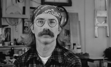 Jim Conlin '74 at home in his garage in Rochester, N.Y., in an undated photo.