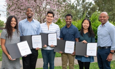 2019 Dean's Awards winners pose with dean Rob Flot