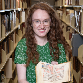 Portrait of Erin Sulla, Arts and Humanities Librarian