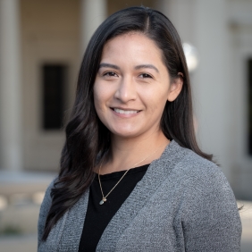 Erica Cisneros wearing gray sweater and black shirt