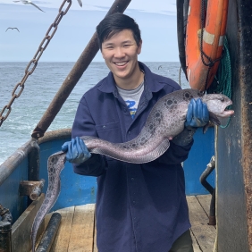 Clay Pollock with a wolf eel