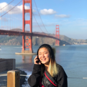 Hyun Gill in front of the Golden Gate Bridge