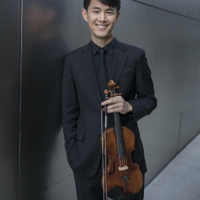 Jin-Shan Dai posing with violin