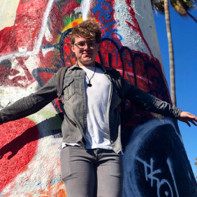 Lulu Wiesemann posing in front of a wall