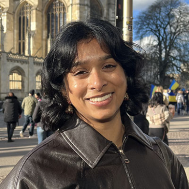 Anissa Basnayake headshot with black coat