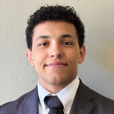 Mario Alvarado headshot suit and tie