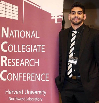 Oxy student Mark Gad at the national collegiate research conference