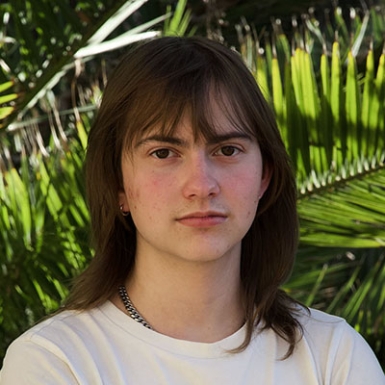 Jay Ward headshot white tshirt, brown hair
