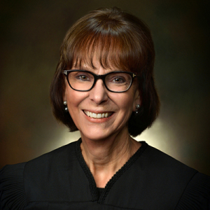 Ann Egerton headshot in a judge's robe