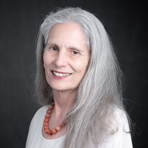 Gloria Duffy headshot with white top