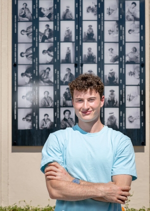 James Steinberger '25 stands in front of photos from Obama's Occidental days.