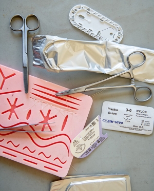 a suture clinic practice suture kit, scissors, suture thread