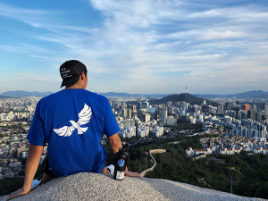 An Occidental student takes in the sights above Seoul, South Korea.