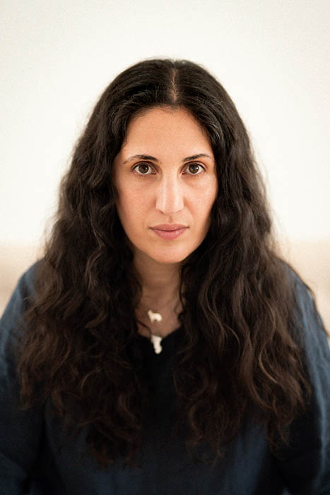 Anahid Yahjian headshot with black sweater