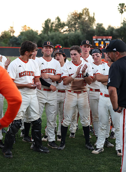 Andy Franck and his Occidental College baseball teammates in their uniforms, gathered together