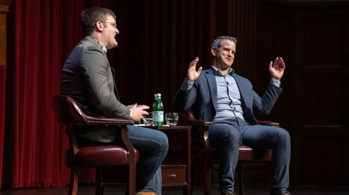 Prof. Isaac Hale and Adam Kinzinger talk on stage at Thorne Hall