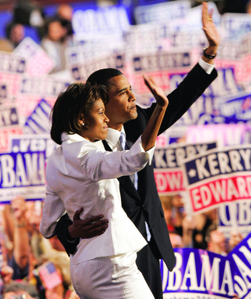 Michelle and Barack Obama acknowledge the cheering masses in Boston in July 2004.