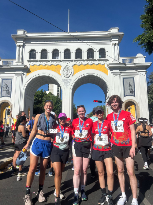Aidan with running friends
