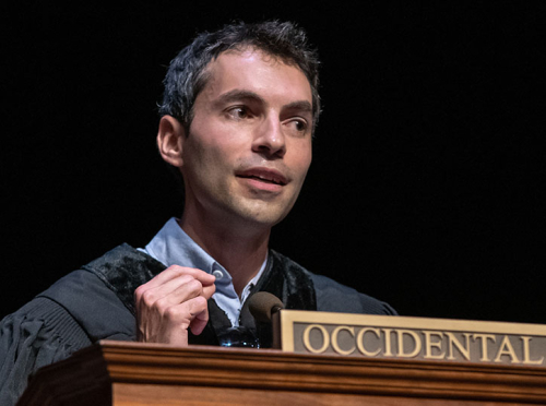 Andrew Jalil talking on stage at Commencement 2018 at Occidental College